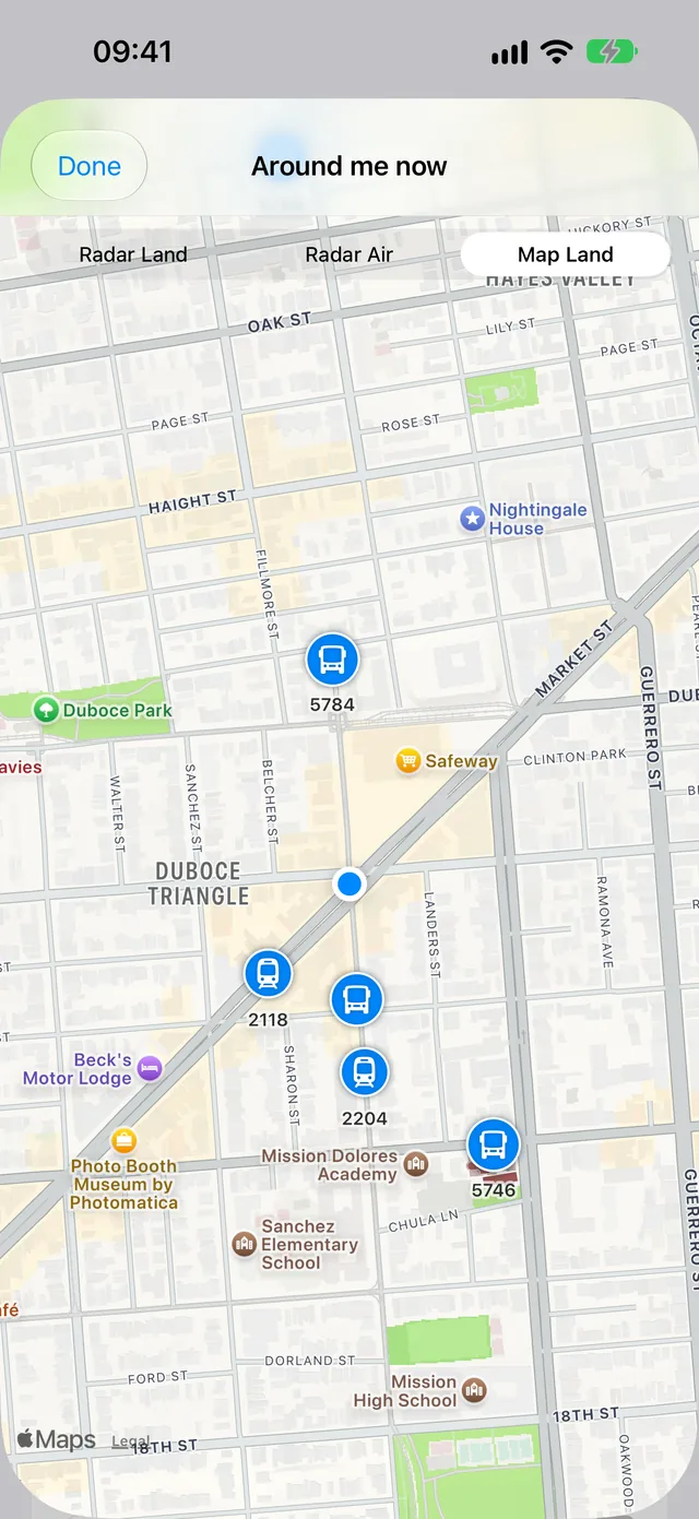 Around me on a map, showing live buses and streetcars near the Duboce Triangle.